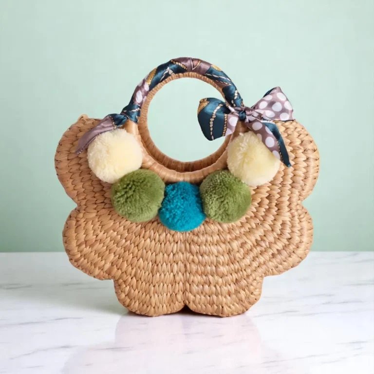 Arun Straw Pom Pom Summer Vacation Bag with round handle and colourful pom poms
