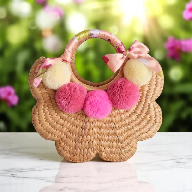 Amporn Handmade Straw Pom Pom Bag with Pink and White Pom-Poms and Floral Handle