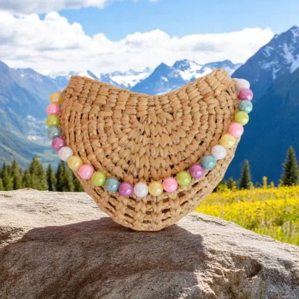 Somchai Eco-Friendly Half Moon Clutch with pastel beads, handmade from straw in Thailand