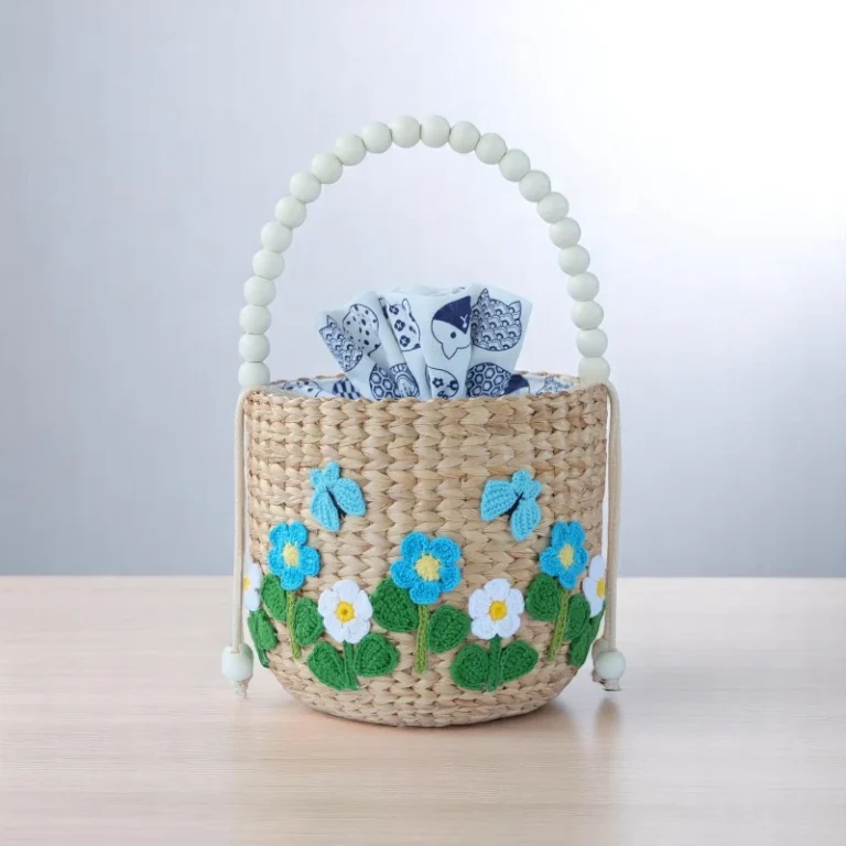 Malai Handwoven Thai Floral Drawstring Straw Bag With Blue Embroidered Flowers