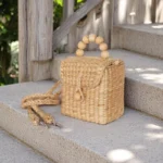 Handmade Juthamas Straw Crossbody Box Bag with Wooden Bead Handle and Custom Colour Options