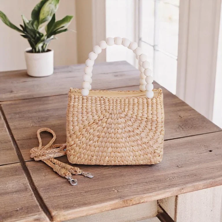 Straw mini bag with white bead handle and detachable crossbody strap