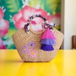 Chalisa handmade straw bag with tassels and crochet flowers