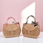 Namthip Straw Woven Bag with Bow Handle in pink and navy