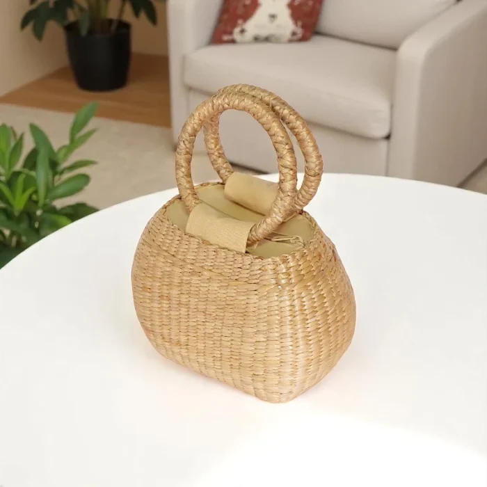 Phanumas Straw Round Handle Purse - Image 1