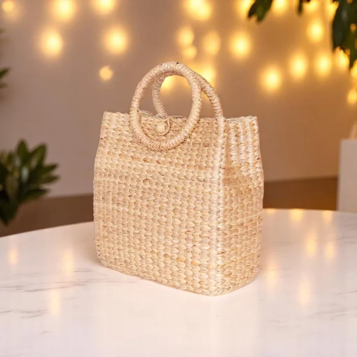 Pattranida Straw Round Handle Tote - Image 1